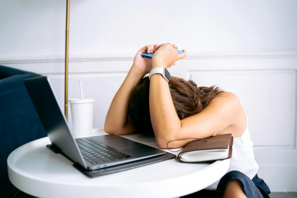 "Overwhelmed business owner with cluttered email inbox needing virtual assistant for email management